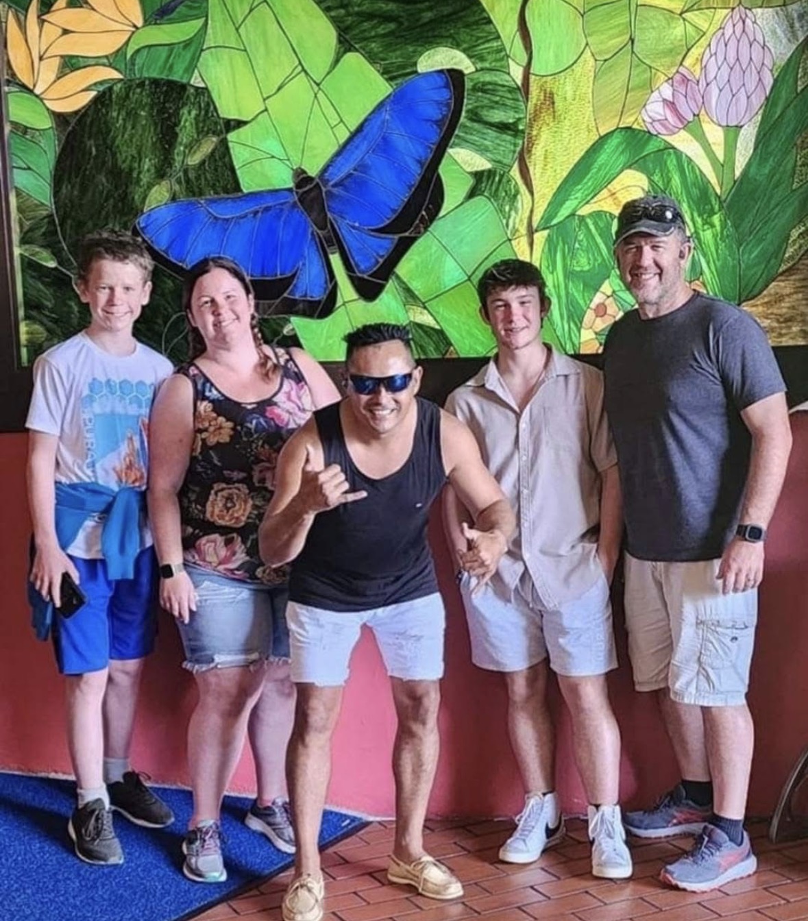 Tour group at the butterfly mural