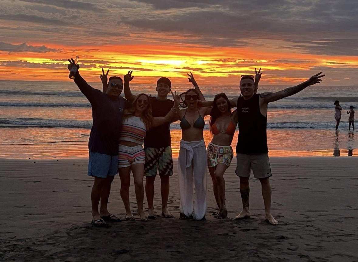 Friends at Costa Rica sunset beach